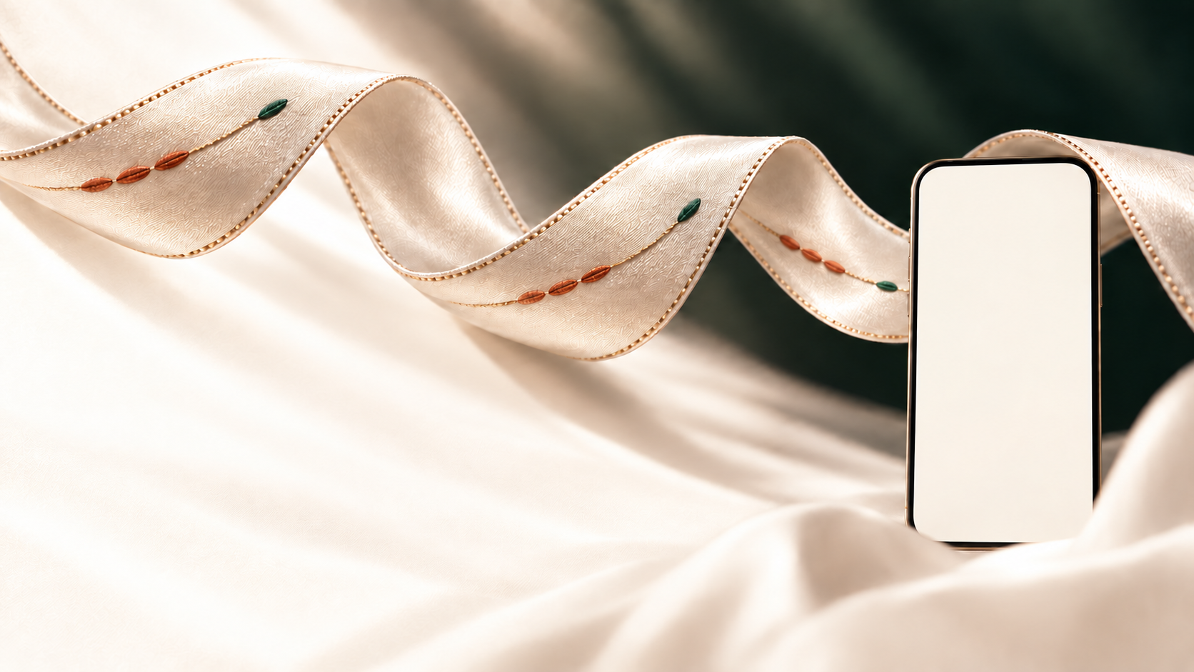 A continuous linen ribbon with repeating green and terracotta stitches